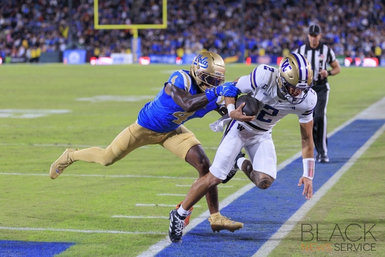 Bruins lose to Huskies, 48-14